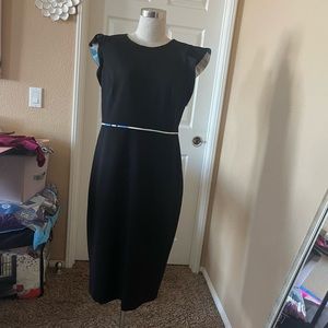 Black Calvin Klein dress with contrasting ruffle sleeve